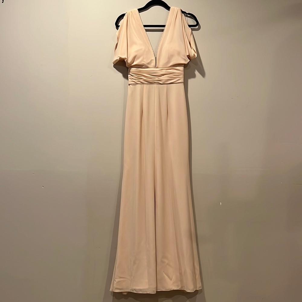 Beautiful cream color gown size 6. Worn once to a wedding